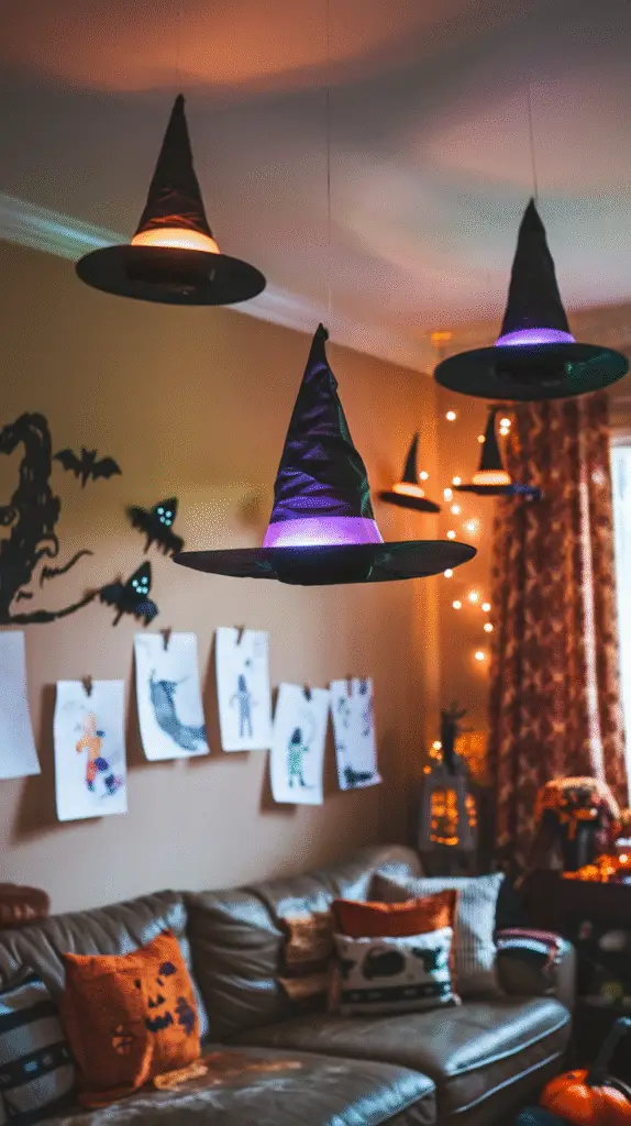 0005_1_a-photo-of-a-living-room-with-diy-floati_tHZWTZ2-TTOg7Nkuyy5E7g_Dly5sTDRQb6syZTUiYBnLQ DIY floating witch hats hanging from a living room ceiling, glowing with soft purple and orange light inside. Kidsā Halloween drawings on the wall and cozy couch with fall pillows in the background.