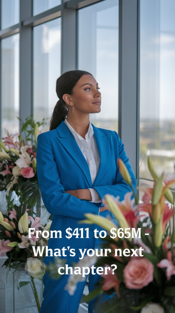 . Text overlay From $411 to $65M - What's Your Next Chapter Confident woman standing in a modern office space with beautiful flower arrangements, looking toward the horizon through large windows. Text overlay From $411 to $65M - What's Your Next Chapter