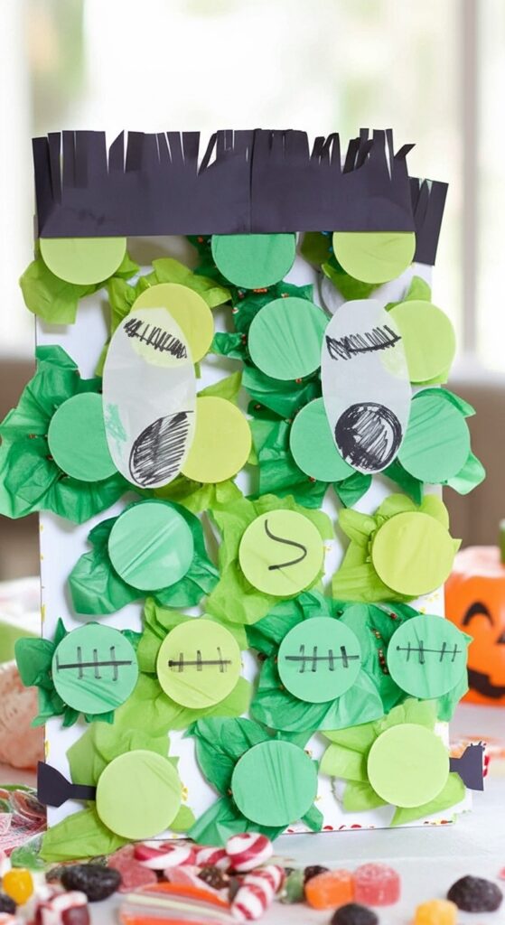 A homemade Frankenstein-themed punch board game for kids’ Halloween party, made with green tissue paper, plastic cups, and cardboard, cute spooky face details, photographed on a party table with candy scattered around, realistic photo.
